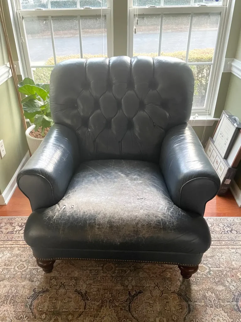 Leather repair Charlotte - Heavily worn leather seat cushion before restoration